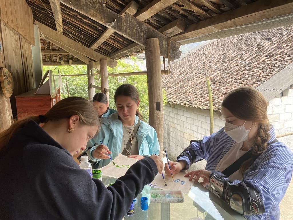 Foreign Tourists Experiencing Traditional Vietnamese Crafts: A Unique Cultural Journey